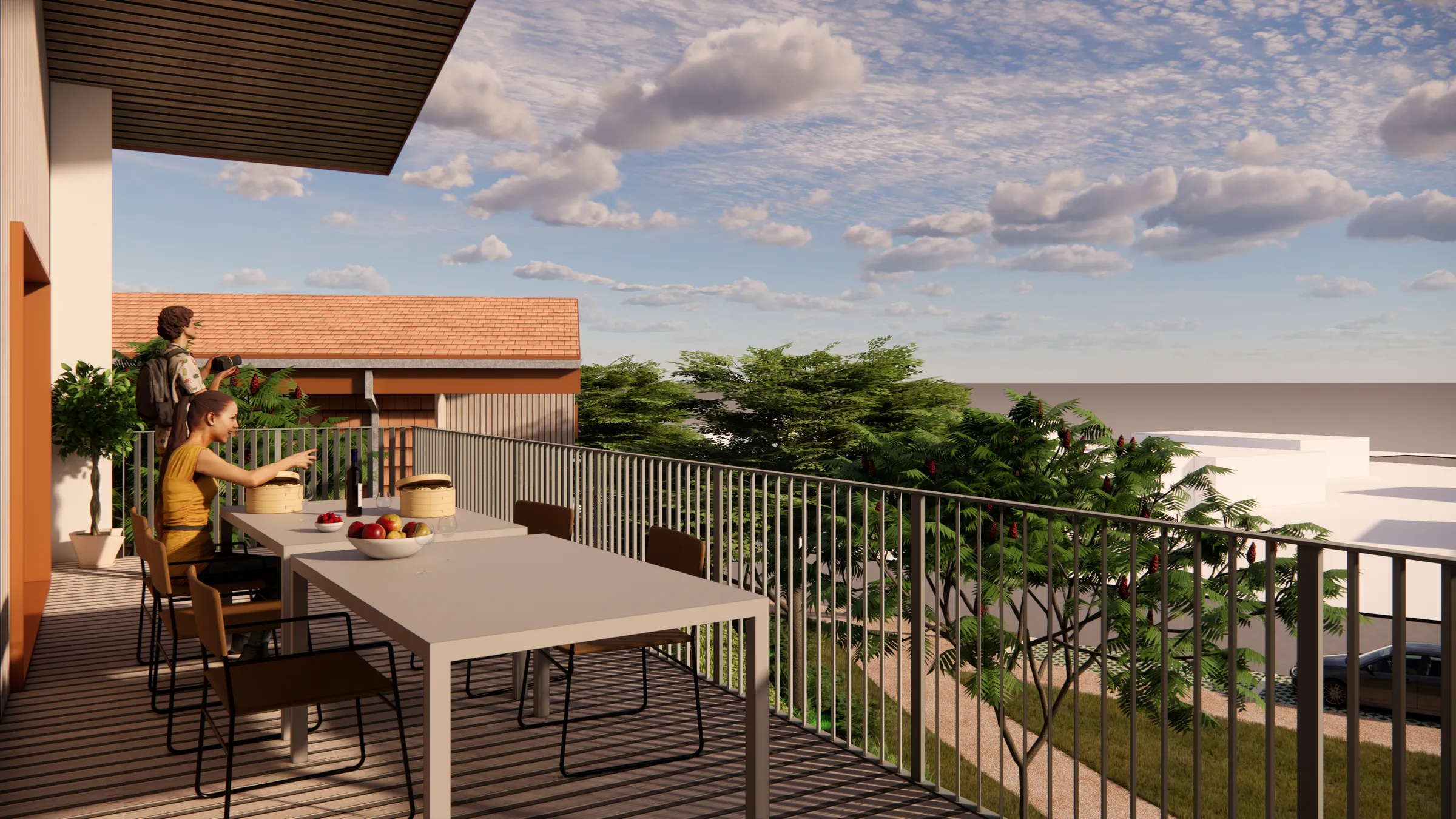Repas sur un grand balcon en bois, vue dégagée sur les arbres.